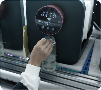 A water sample being taken while an appliance runs on the verification line.
